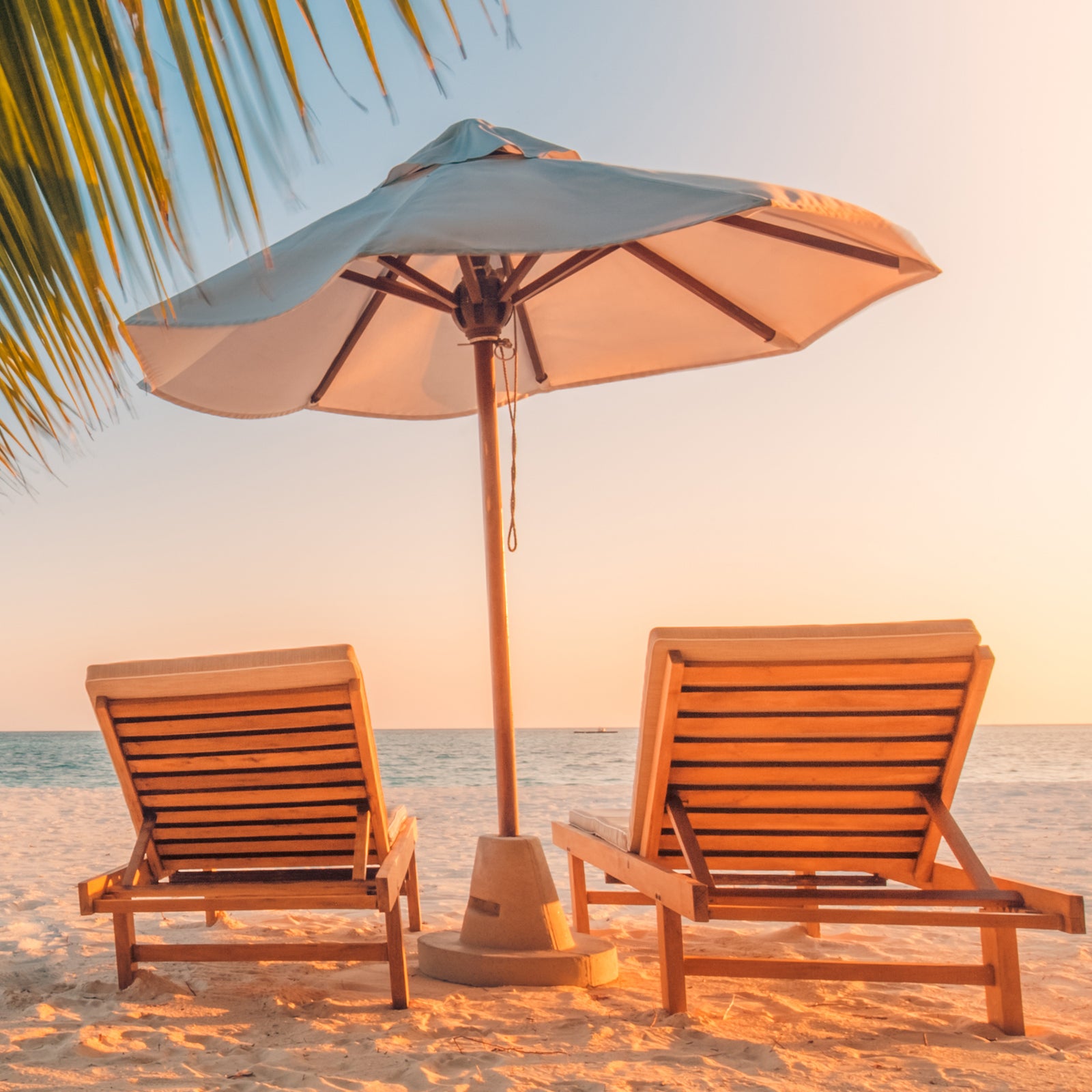 Image, Frontcountry, Beach Chaird, Sun Umbrella, an a sandy ocean beach